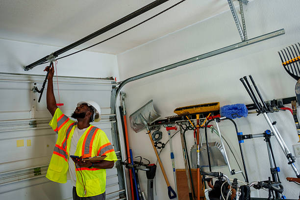 Professional Garage Door Panel Replacement technician working in Amherst, OH
